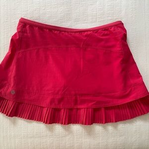 Reddish pink tennis skirt
